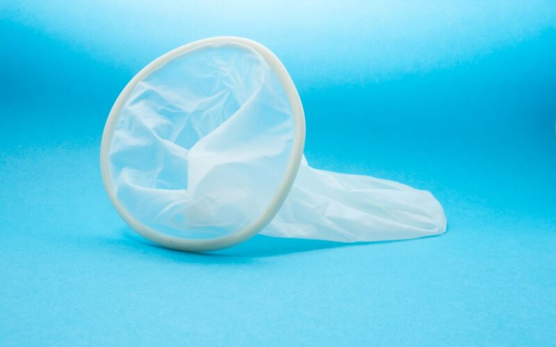 white condom in blue background